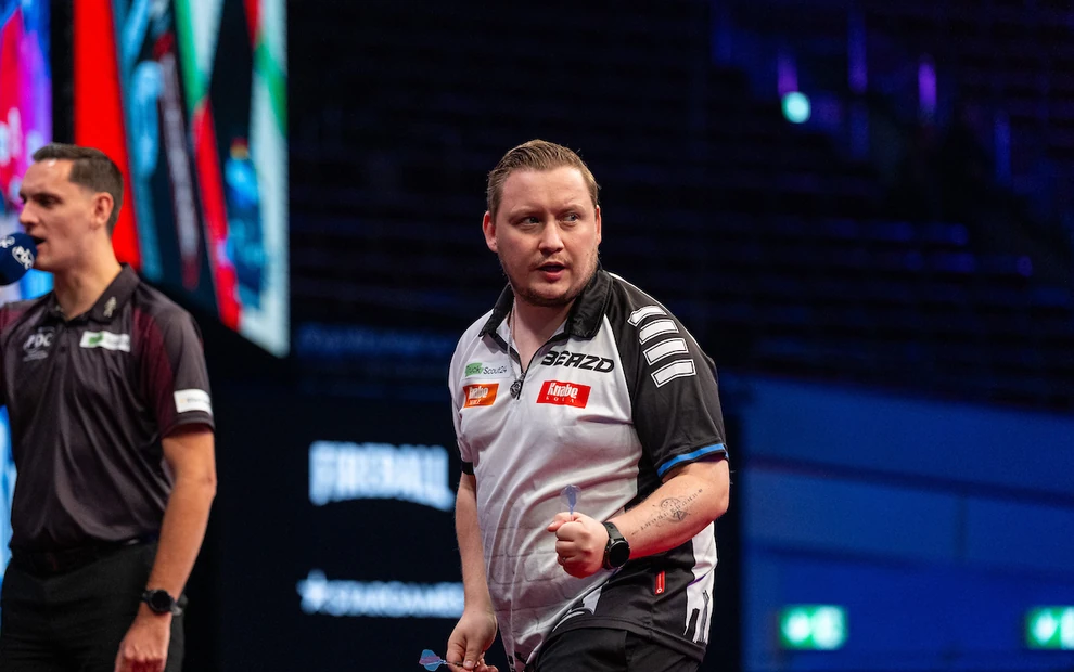 Photo: dartsinside.de Martin Schindler jubelt bei der European Championship 2026 in Dortmund mit geballter Faust über seinen Erfolg gegen Jonny